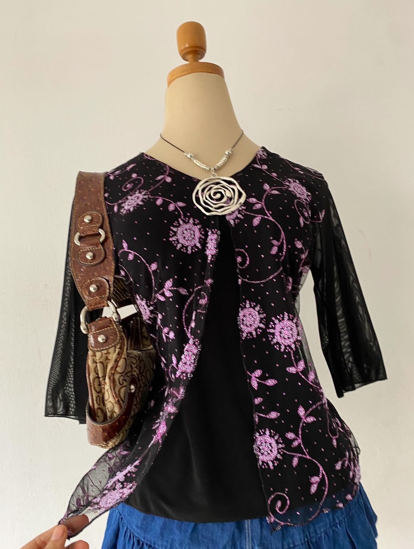 Adorable cape top with lilac designs