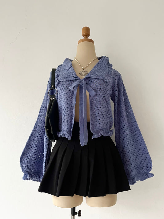 Knitted cardigan with bow