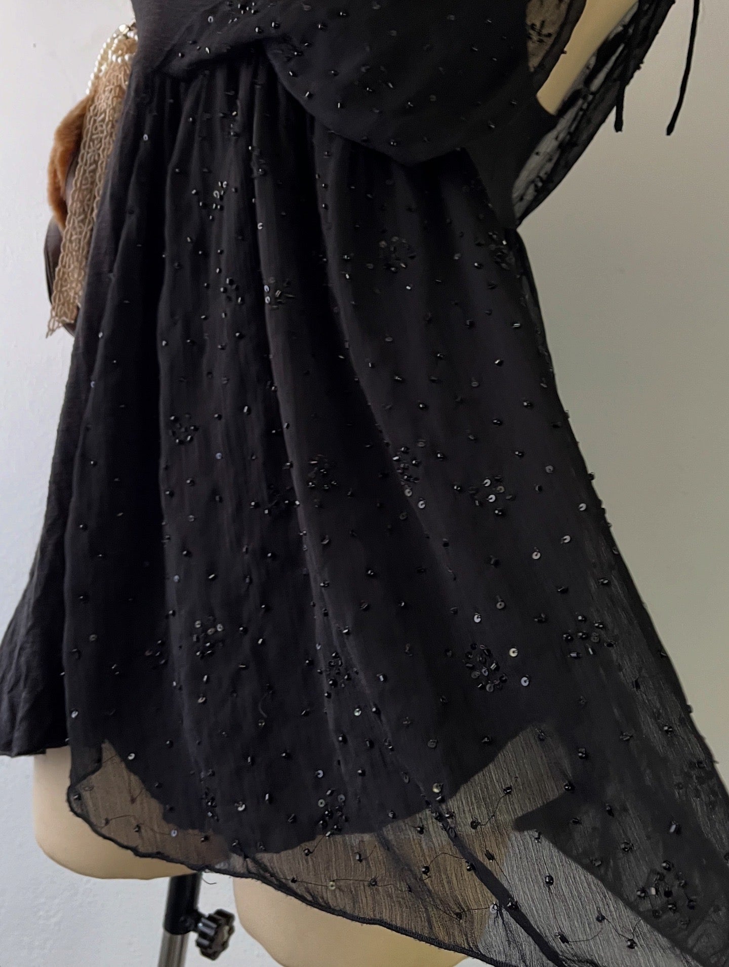 Adorable black top with sequins