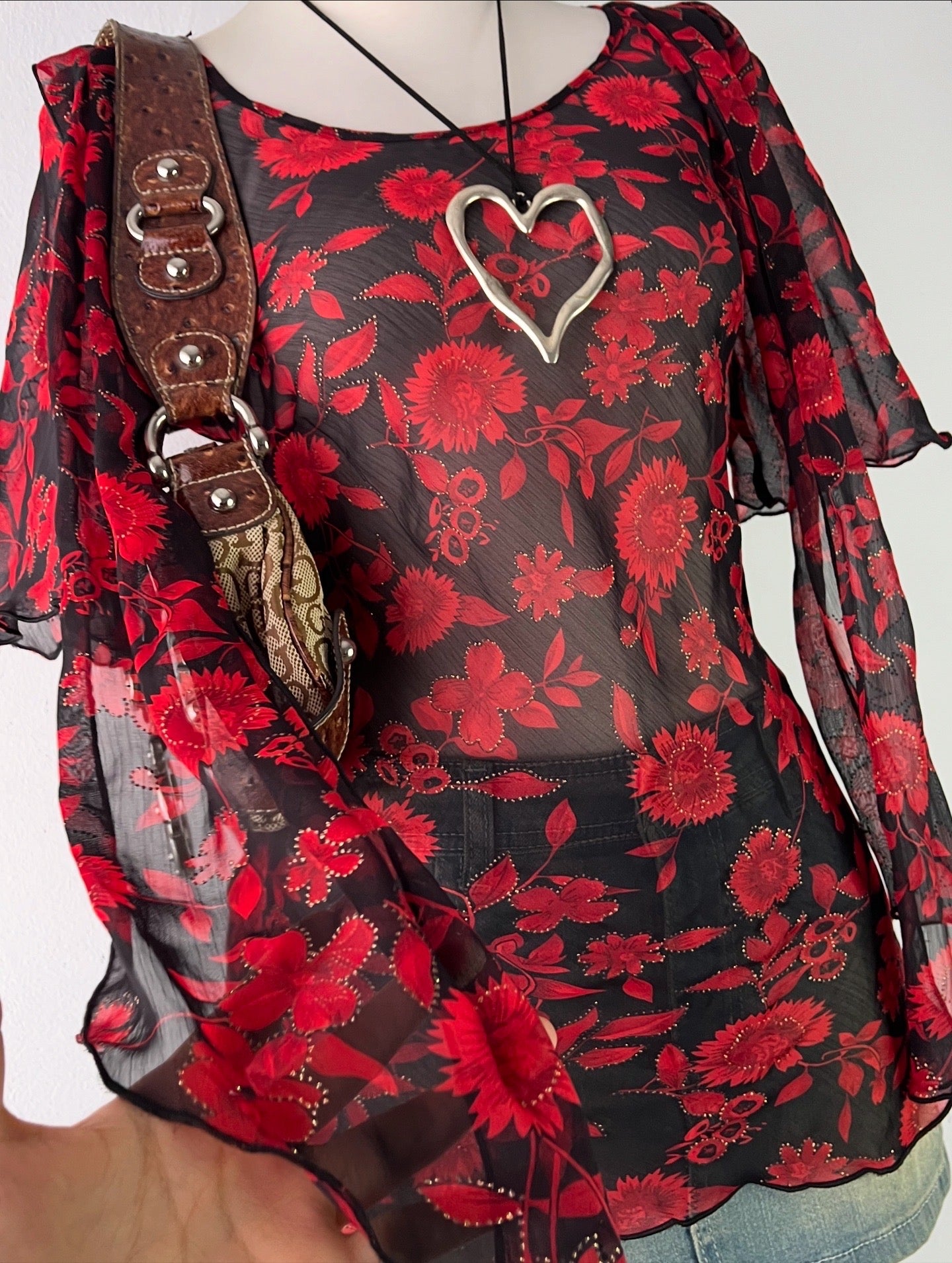 Floral blouse with hanging bows