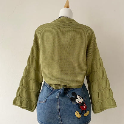 Waist-high sweater with braided design