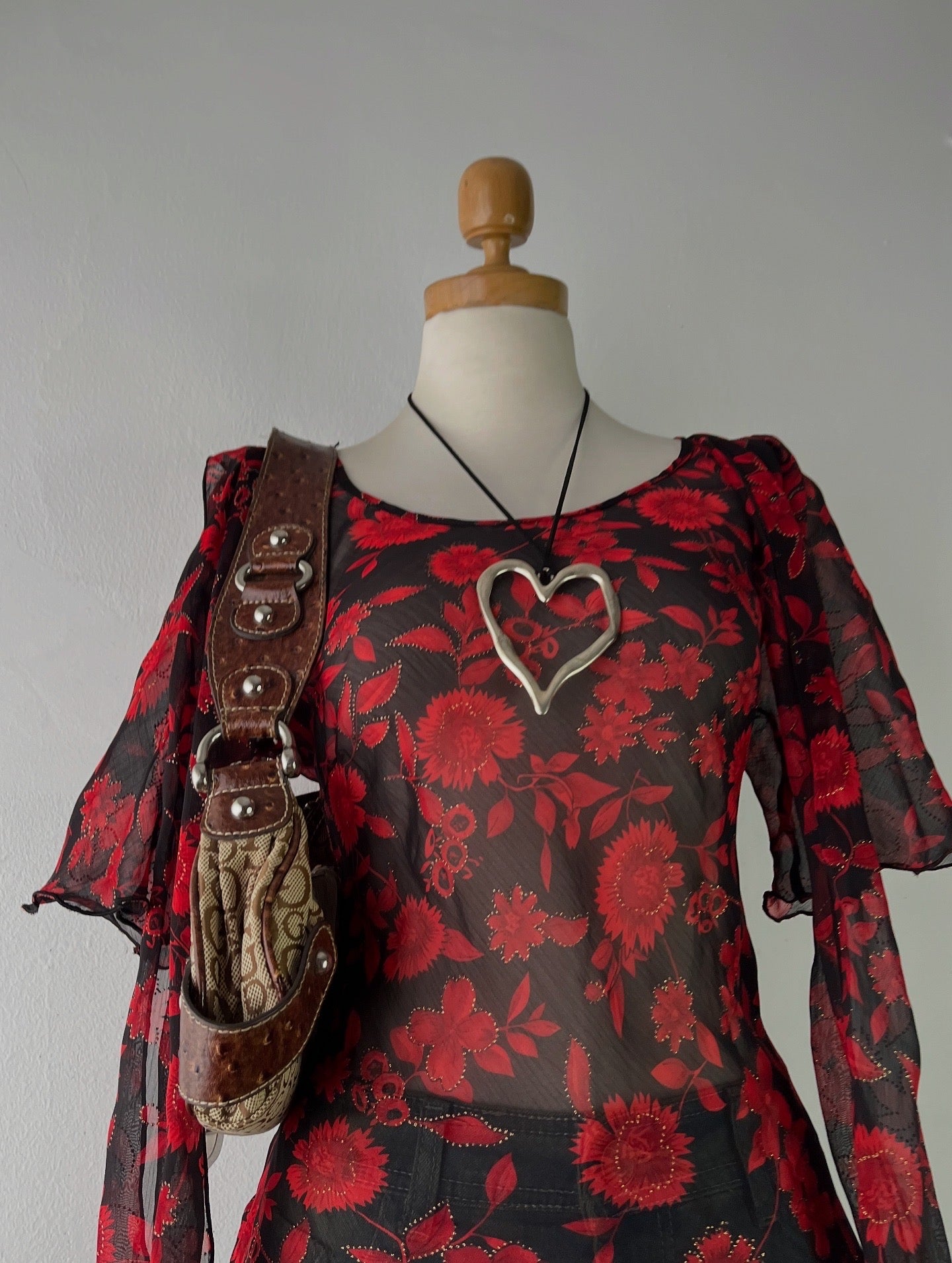 Floral blouse with hanging bows