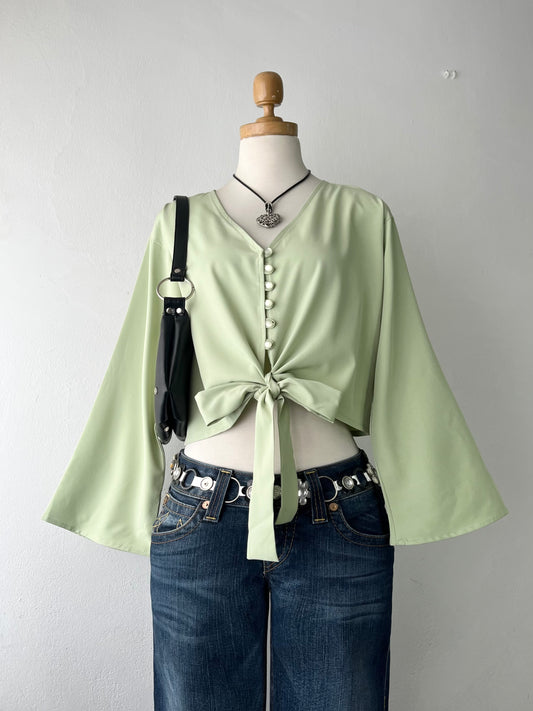 Olive green blouse with bow and wide sleeves