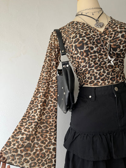 Animal print wrap-around blouse with flared sleeves
