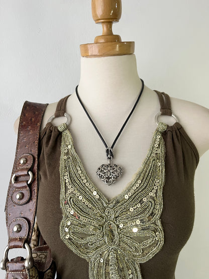 Top with embroidered butterfly design