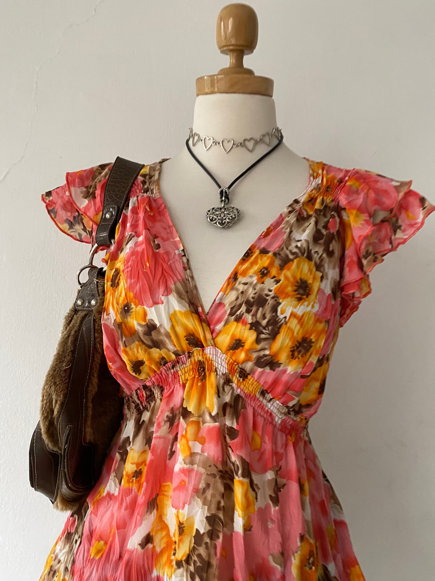Adorable floral blouse with back bow