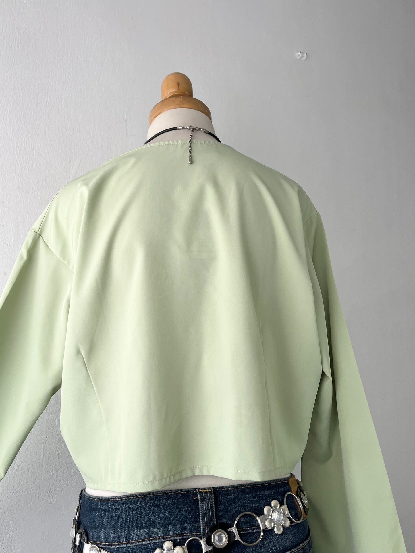 Olive green blouse with bow and wide sleeves