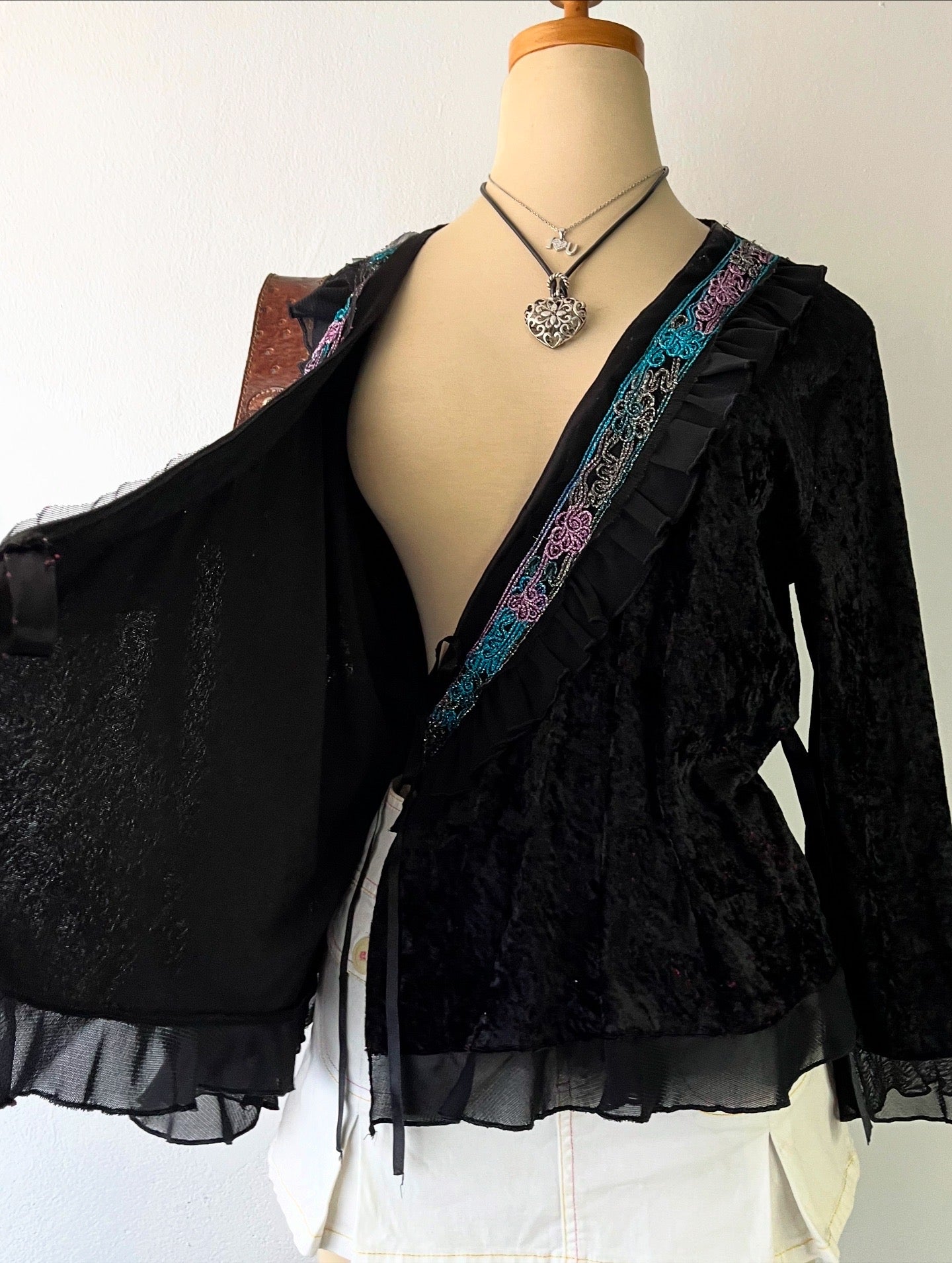 Wrap blouse with embroidered designs