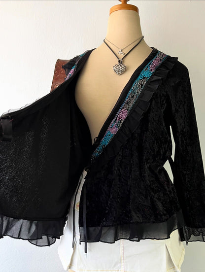Wrap blouse with embroidered designs
