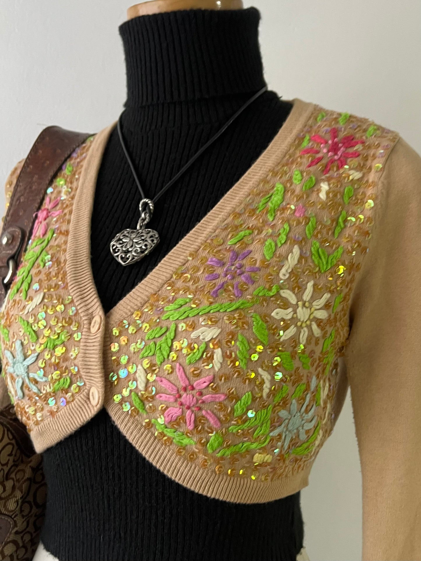 Beige knitted cardigan with hand embroidery