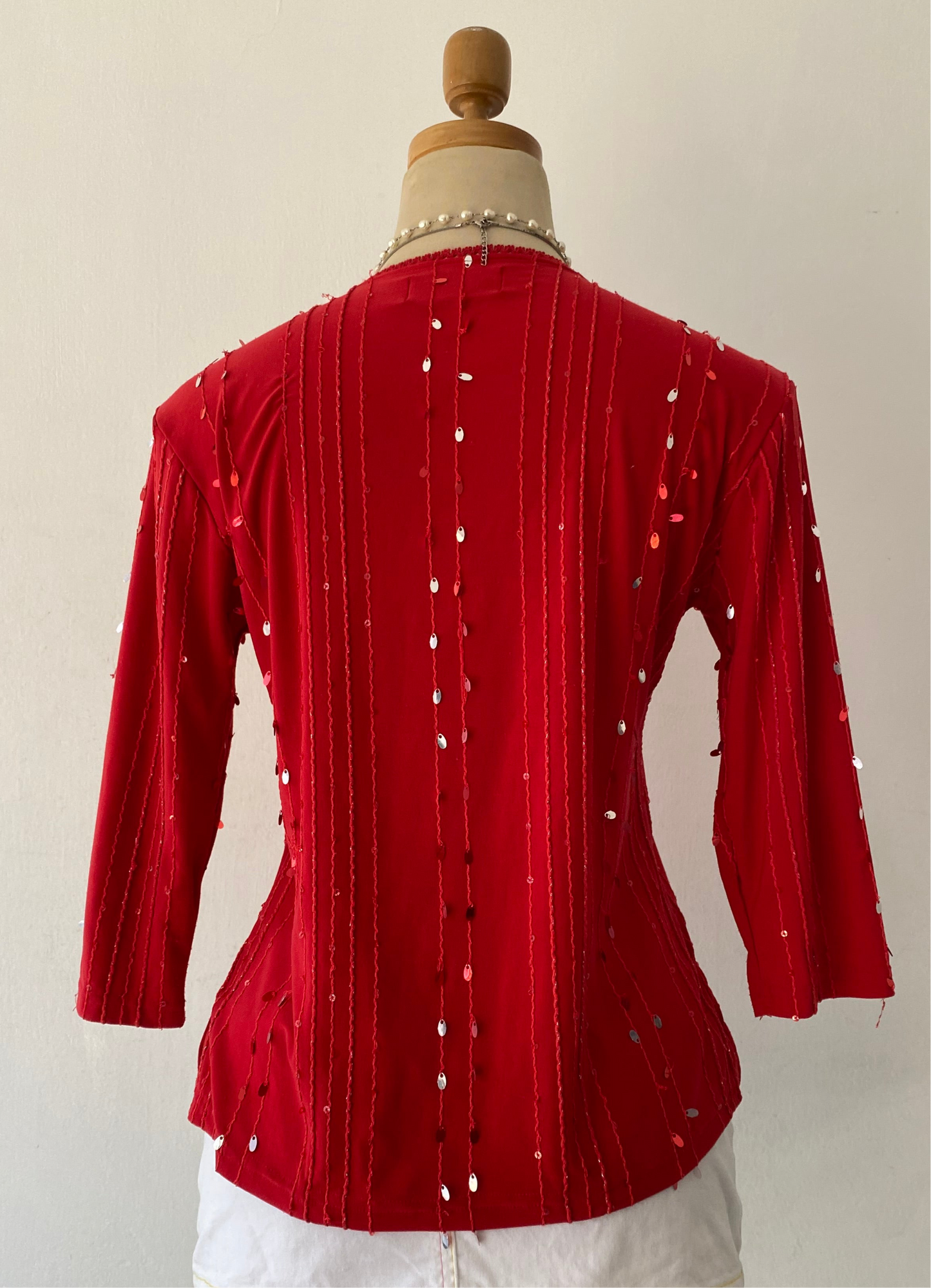 Red top with sequins