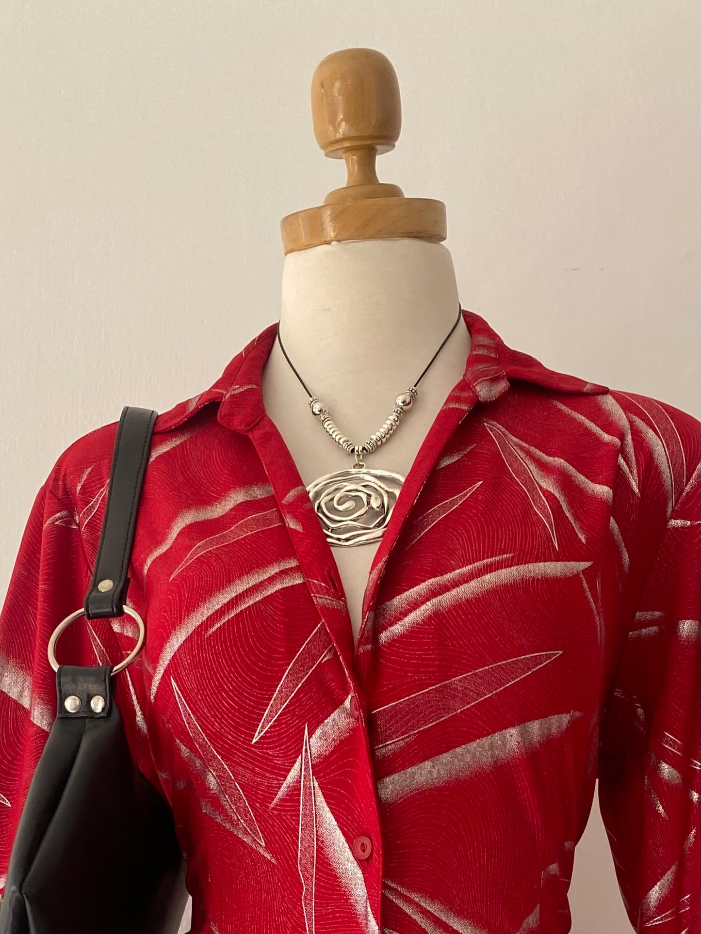Red blouse with silver sparkles