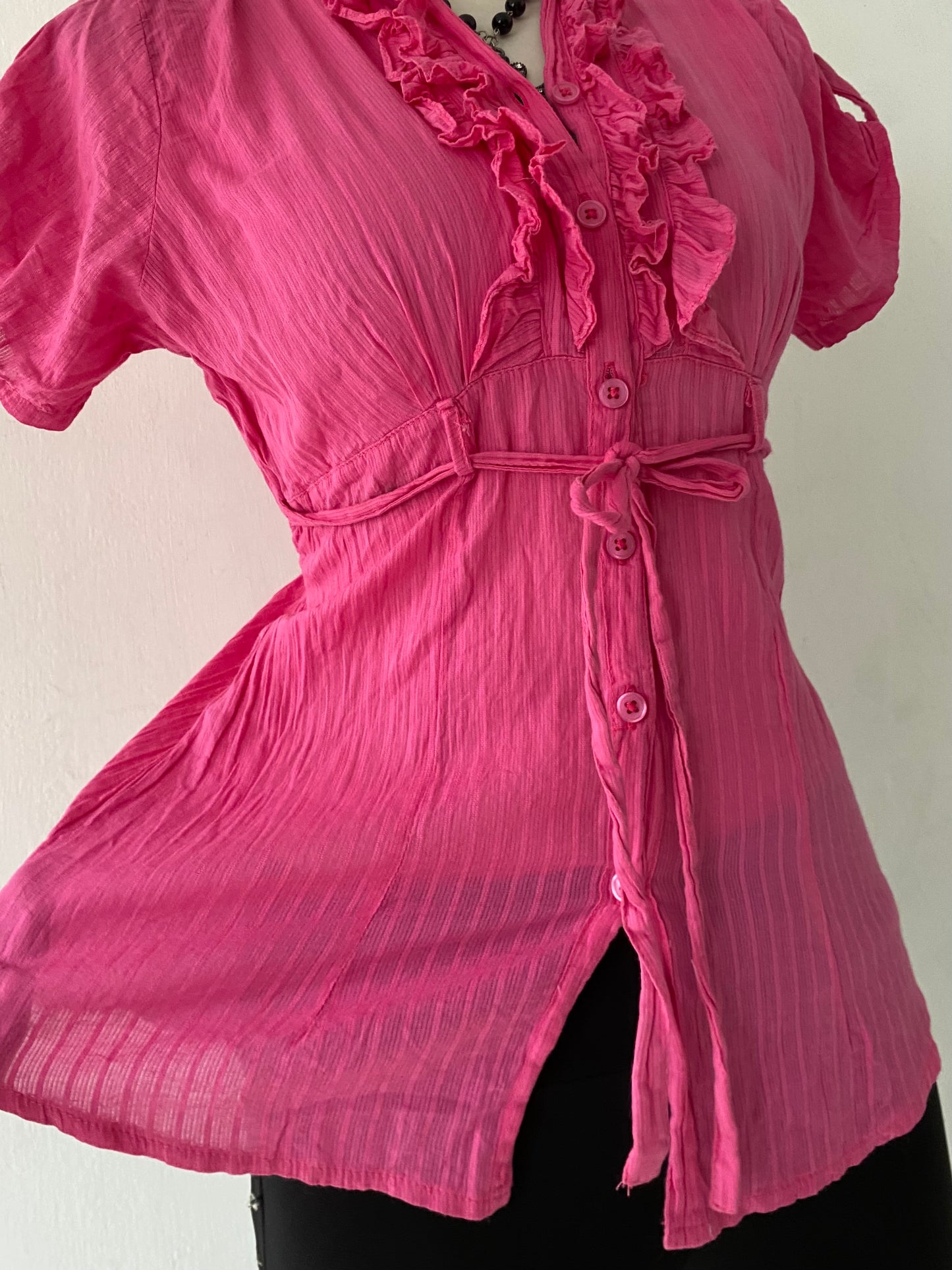 Pink top with bow
