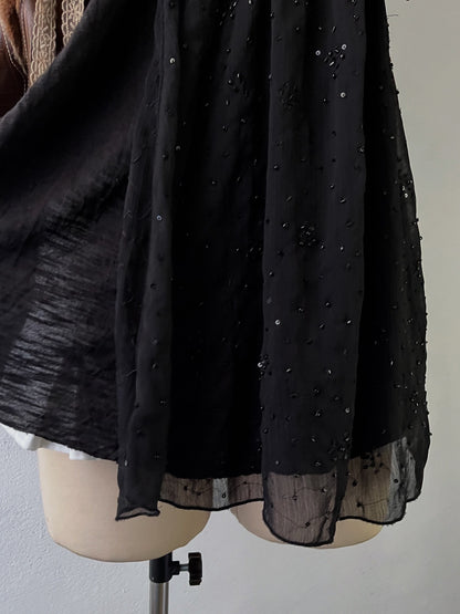 Adorable black top with sequins