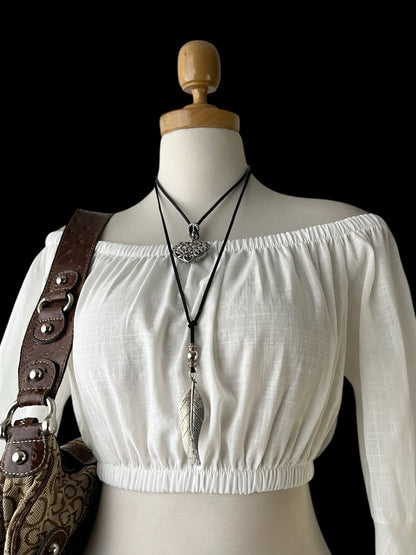 Bell-sleeved off shoulder top