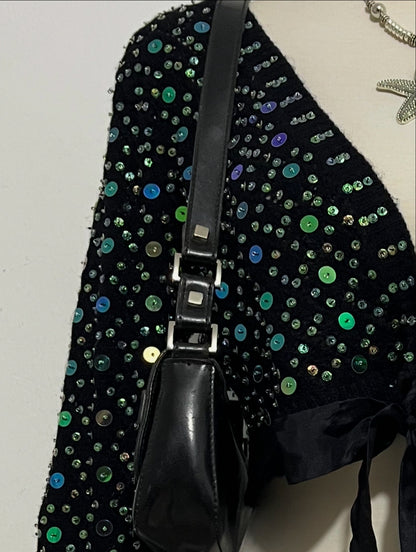 Knitted cardigan with sequins and bow