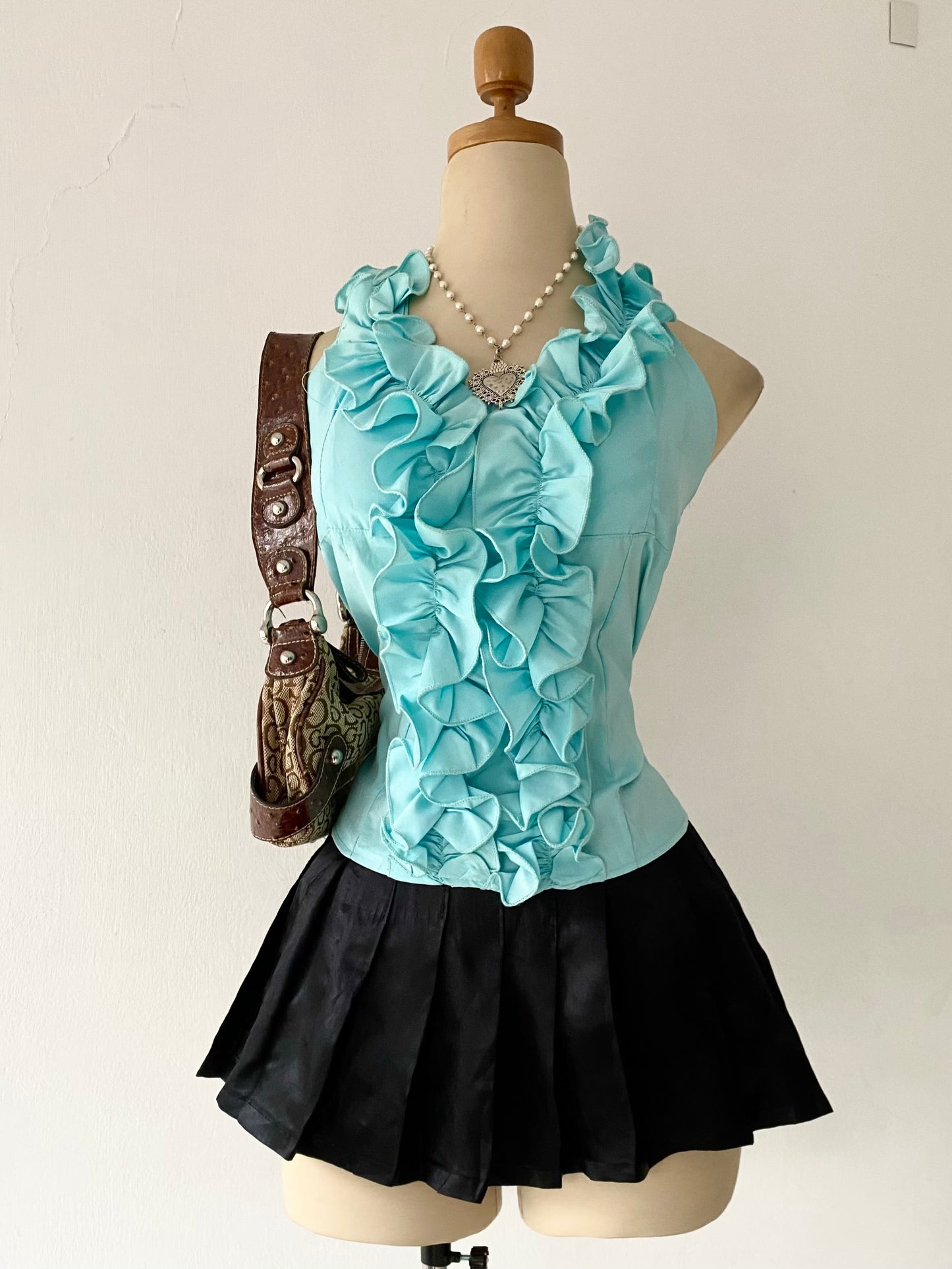 Light blue ruffled top-size M