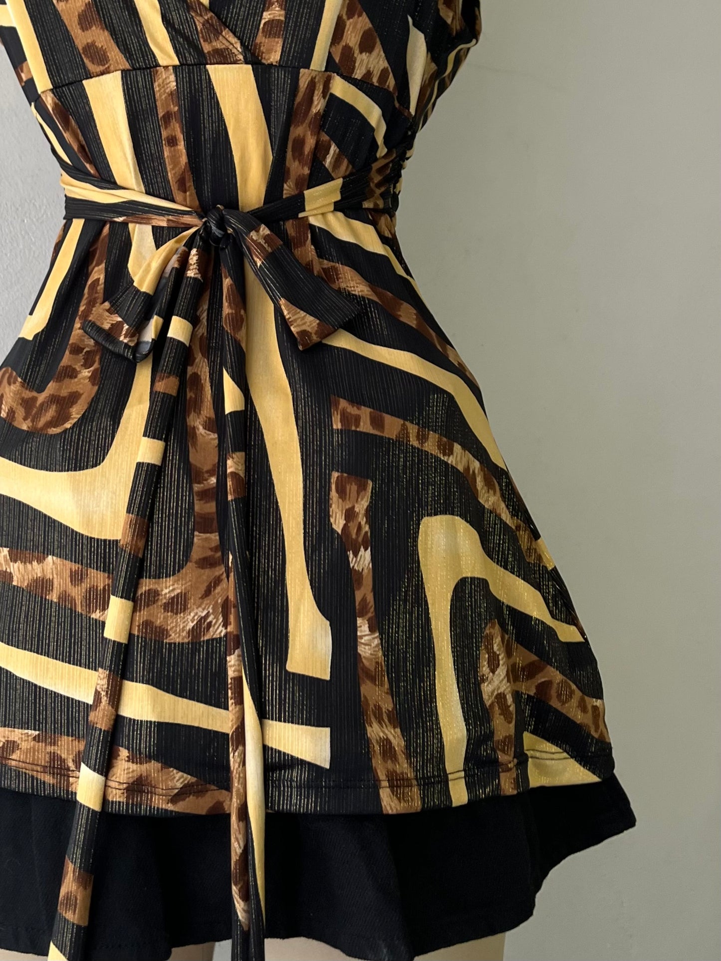 Animal print top with back bow