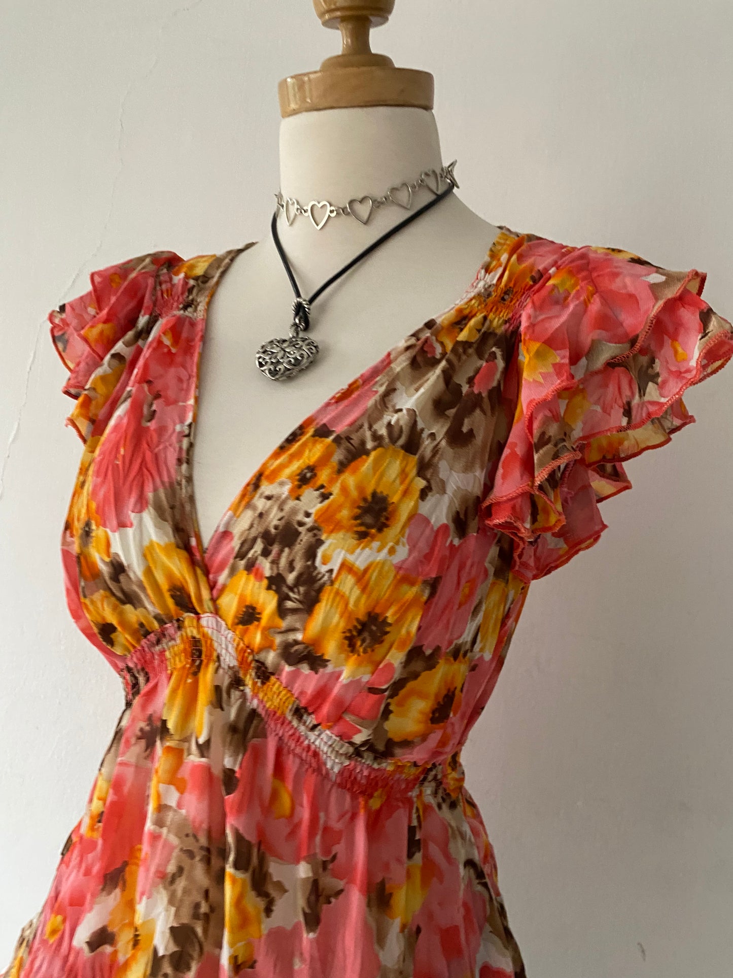 Adorable floral blouse with back bow