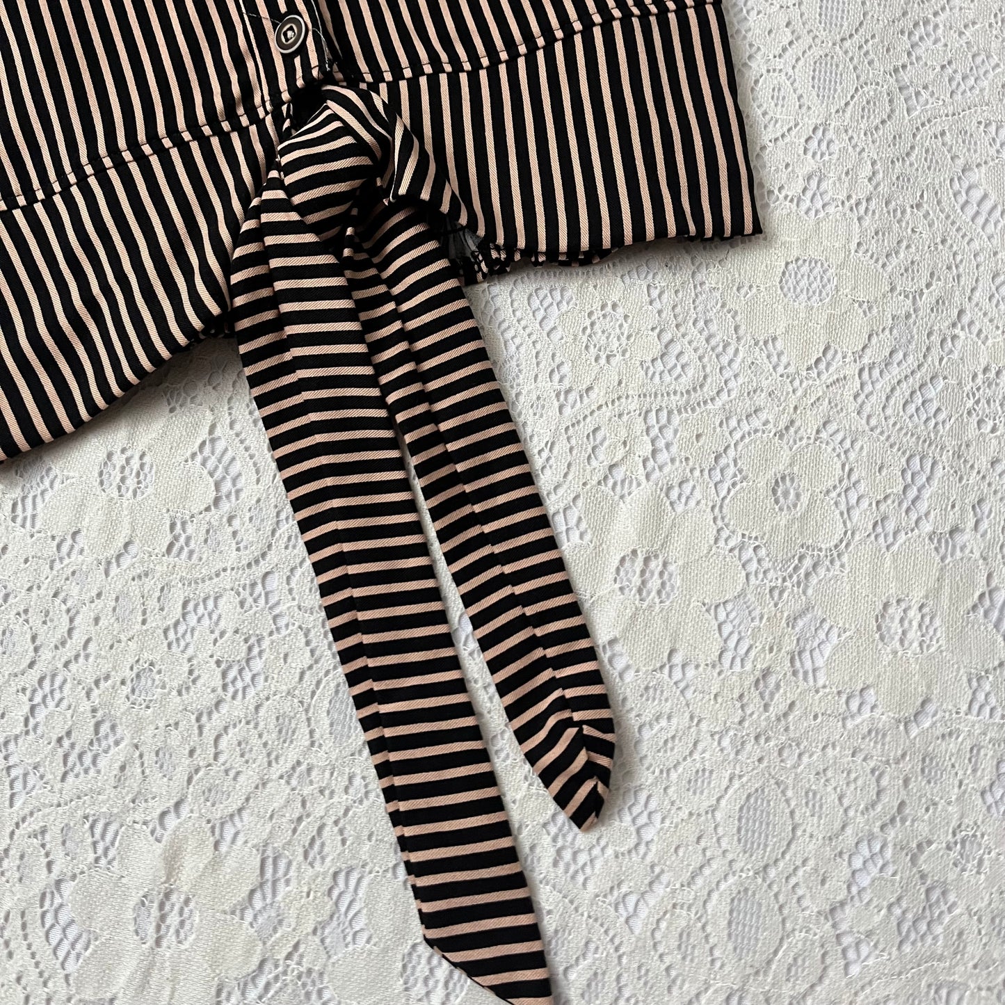 Striped top with bow