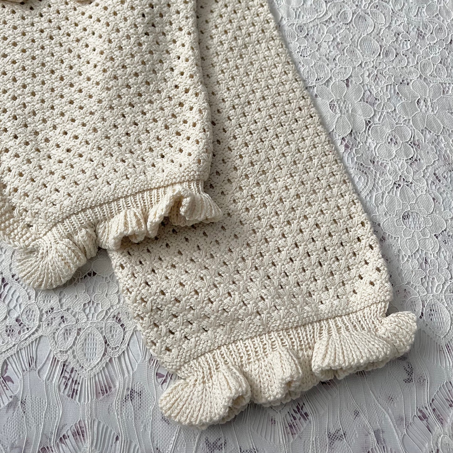 Knitted cardigan with bow