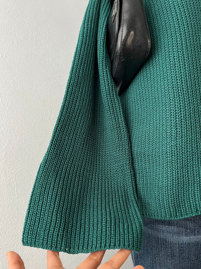 Green off-the-shoulder sweater with wide sleeves