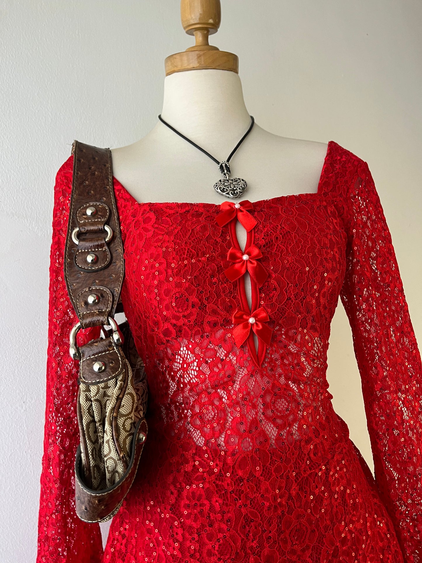 Red lace dress with flared sleeves