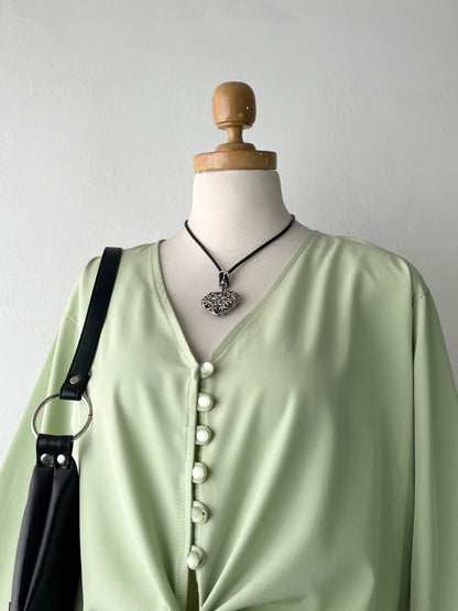 Olive green blouse with bow and wide sleeves