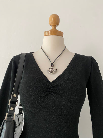 Bell-sleeved top