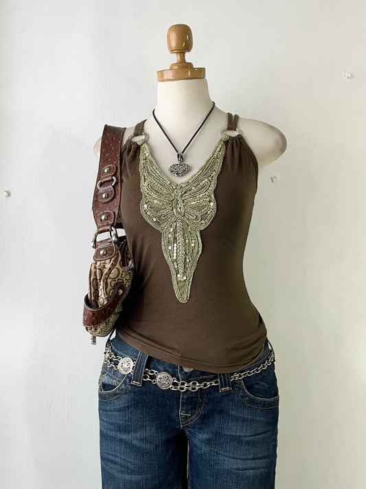 Top with embroidered butterfly design