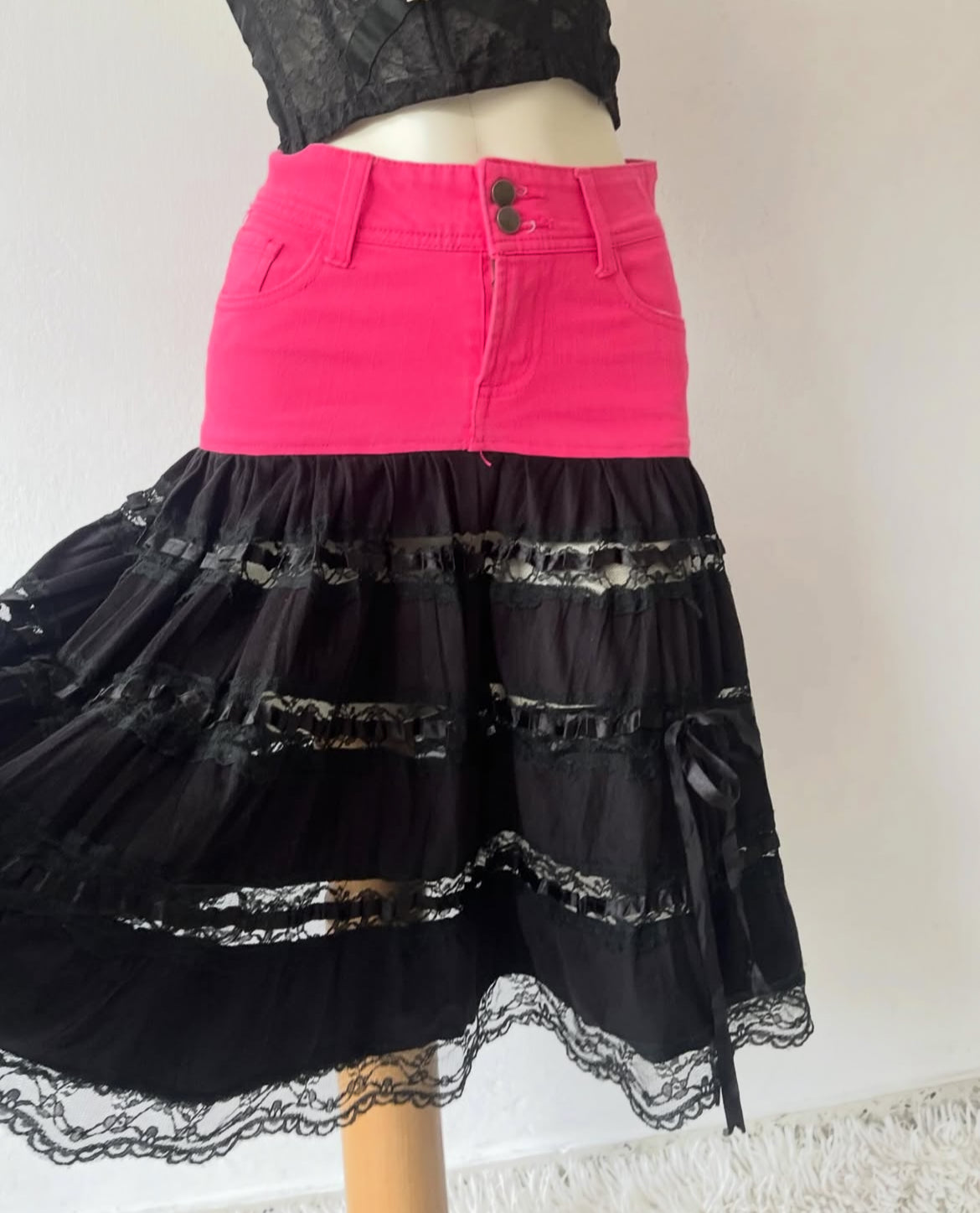 Black lace skirt with pink jeans