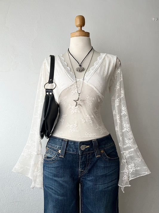 White lace top with flared sleeves