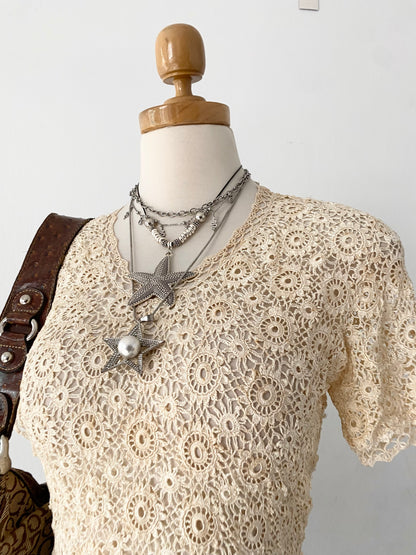 Knitted macrame top with back bow
