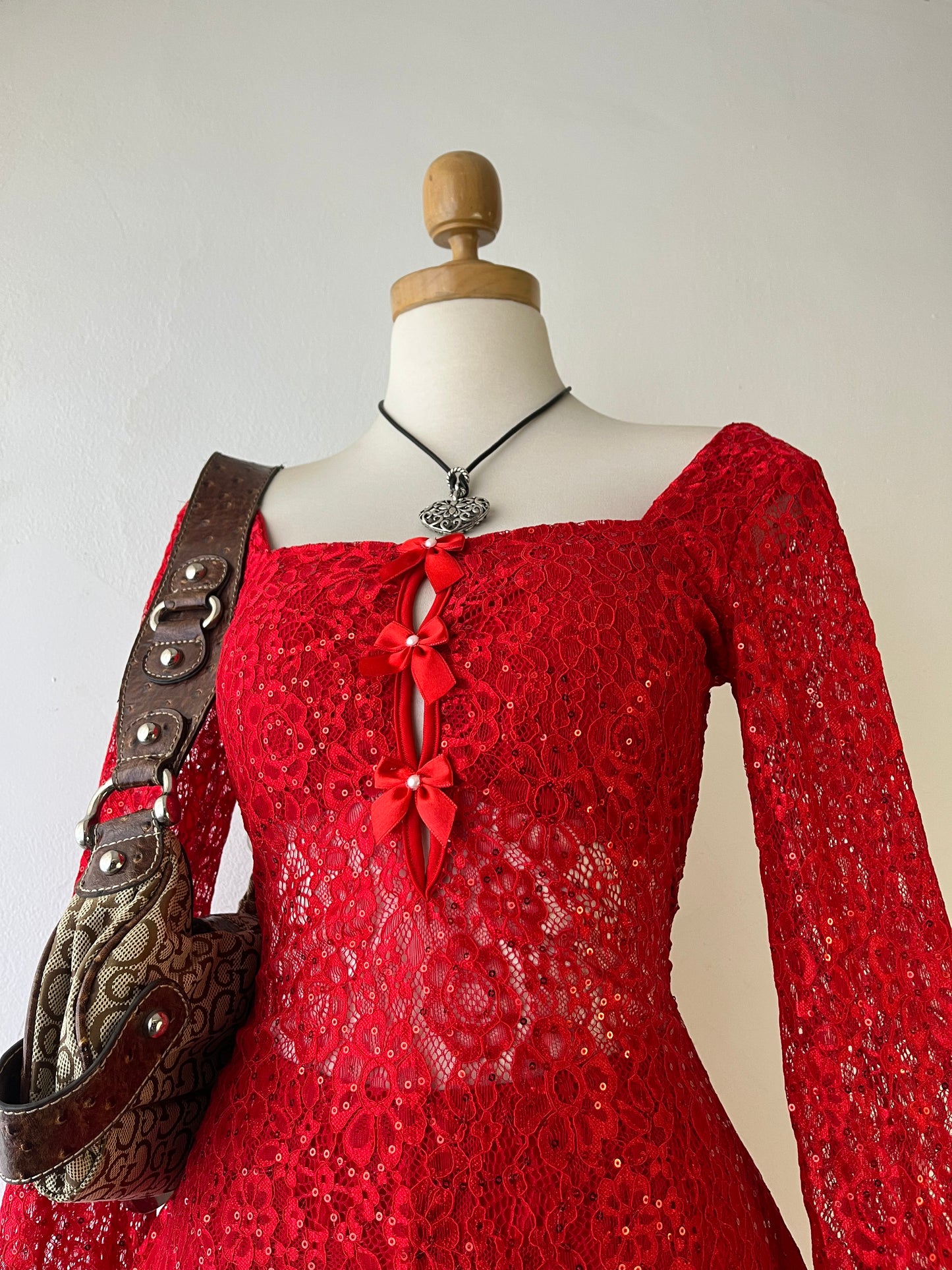 Red lace dress with flared sleeves