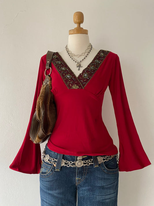 Bell-sleveed burgundy top