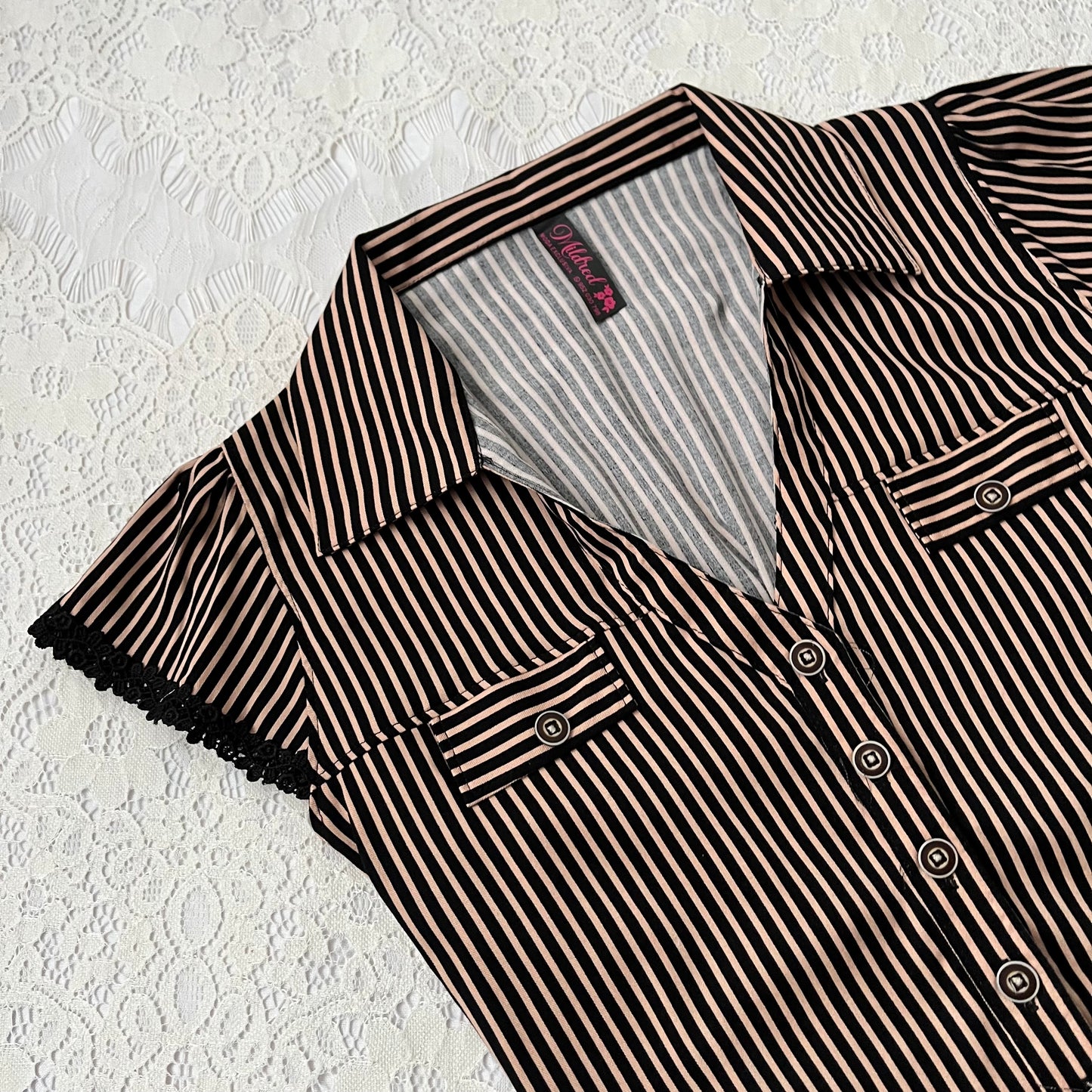 Striped top with bow