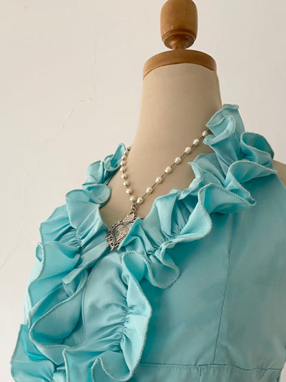 Light blue ruffled top-size M