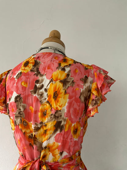 Adorable floral blouse with back bow