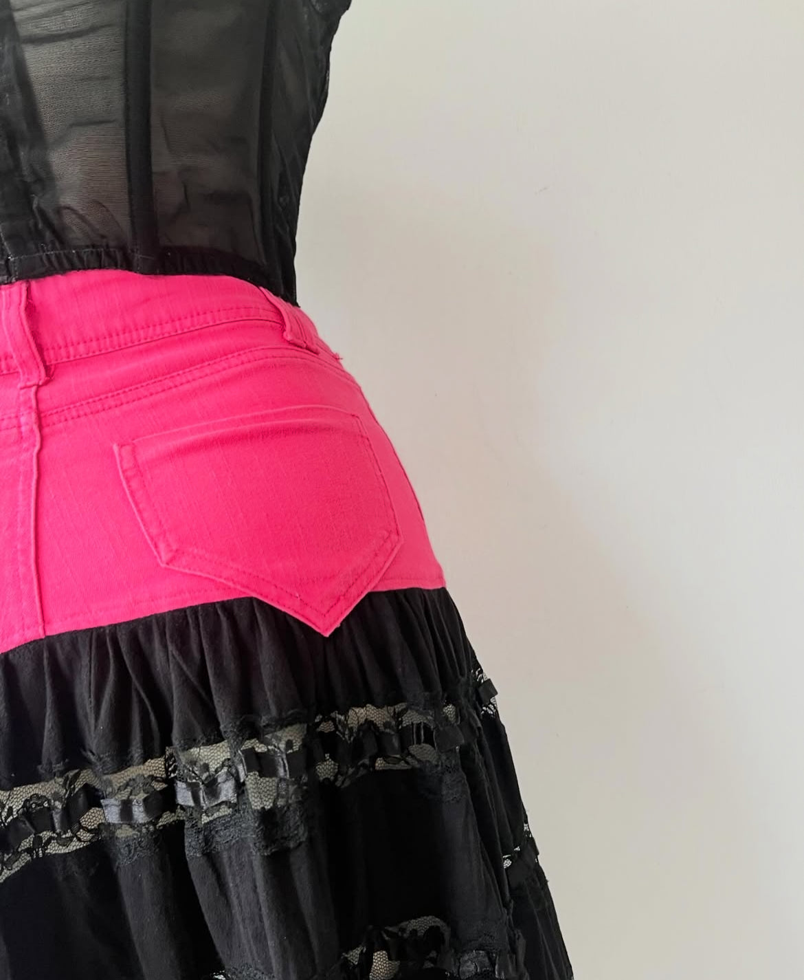Black lace skirt with pink jeans