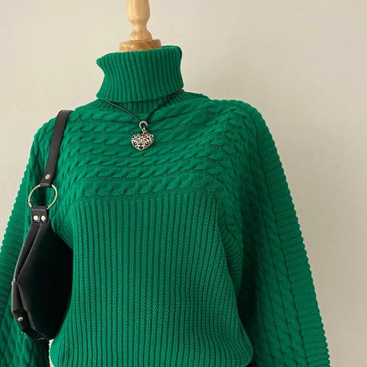 Oversized sweater with braided design