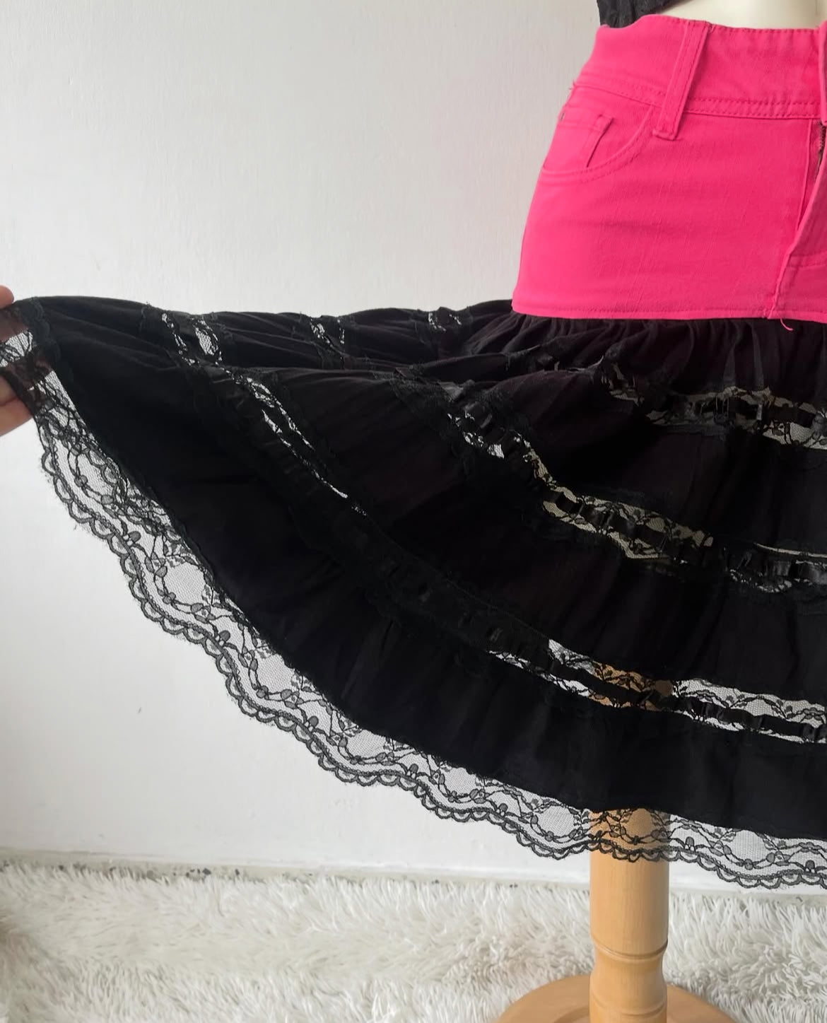 Black lace skirt with pink jeans