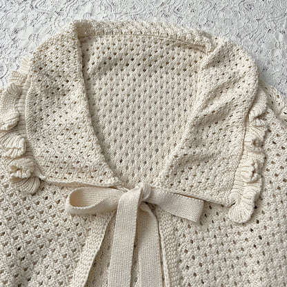 Knitted cardigan with bow