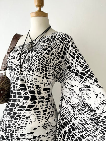 Super flared one-shoulder polydress