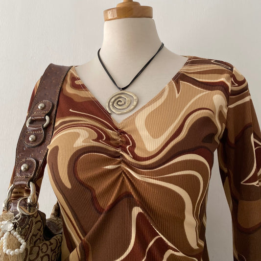 Bell-sleveed top