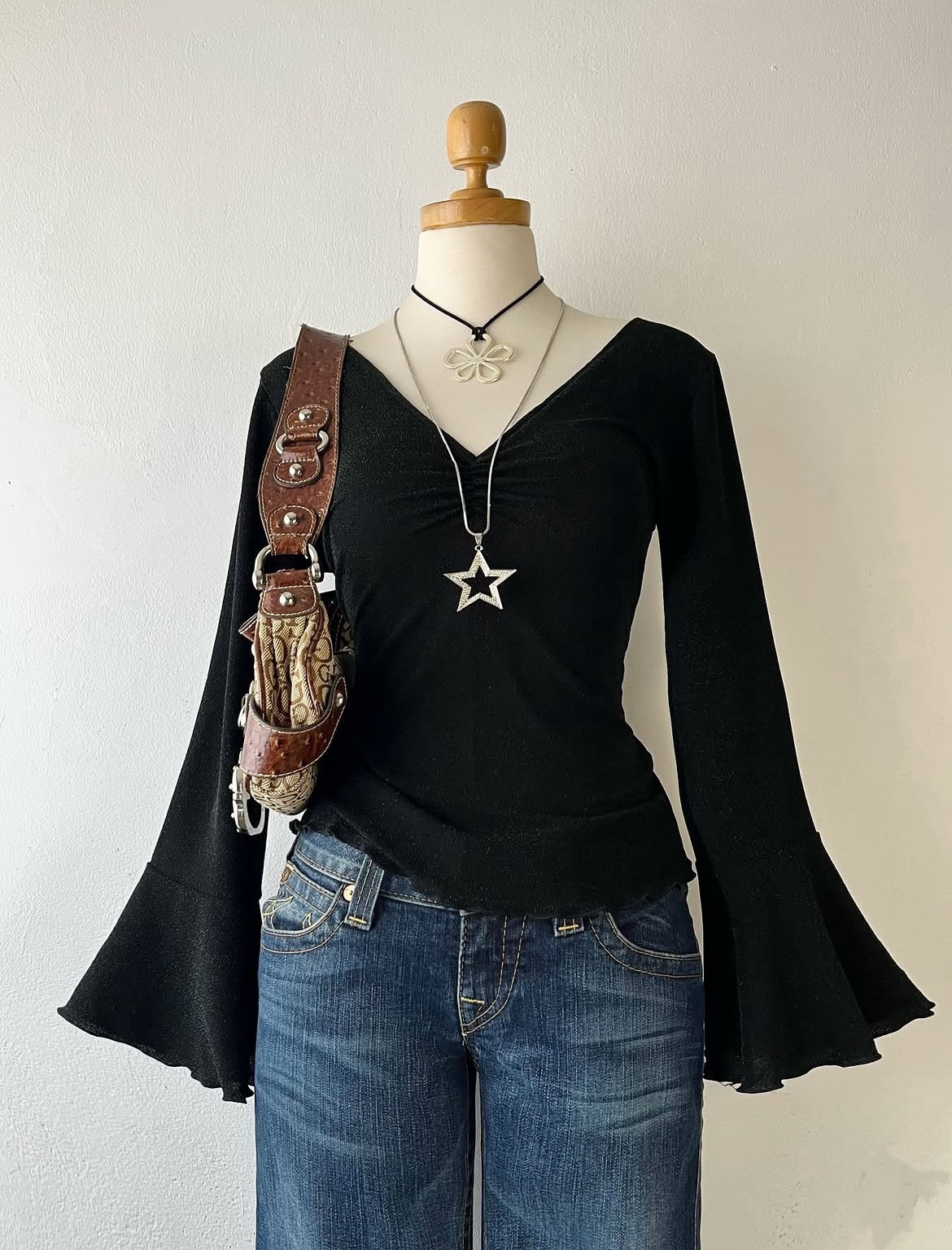 Bell-sleeved top with silver sparkles