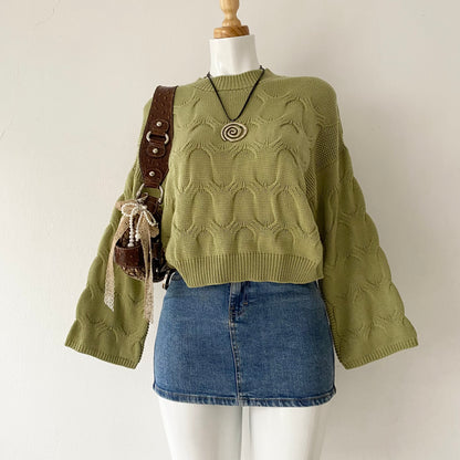 Waist-high sweater with braided design