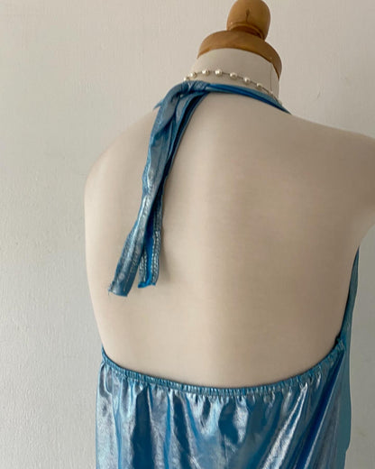 Top tornasol celeste