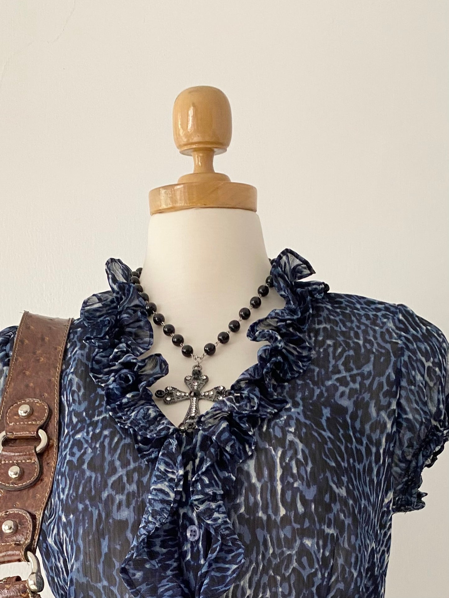 Cheetah print blouse with bow on the back