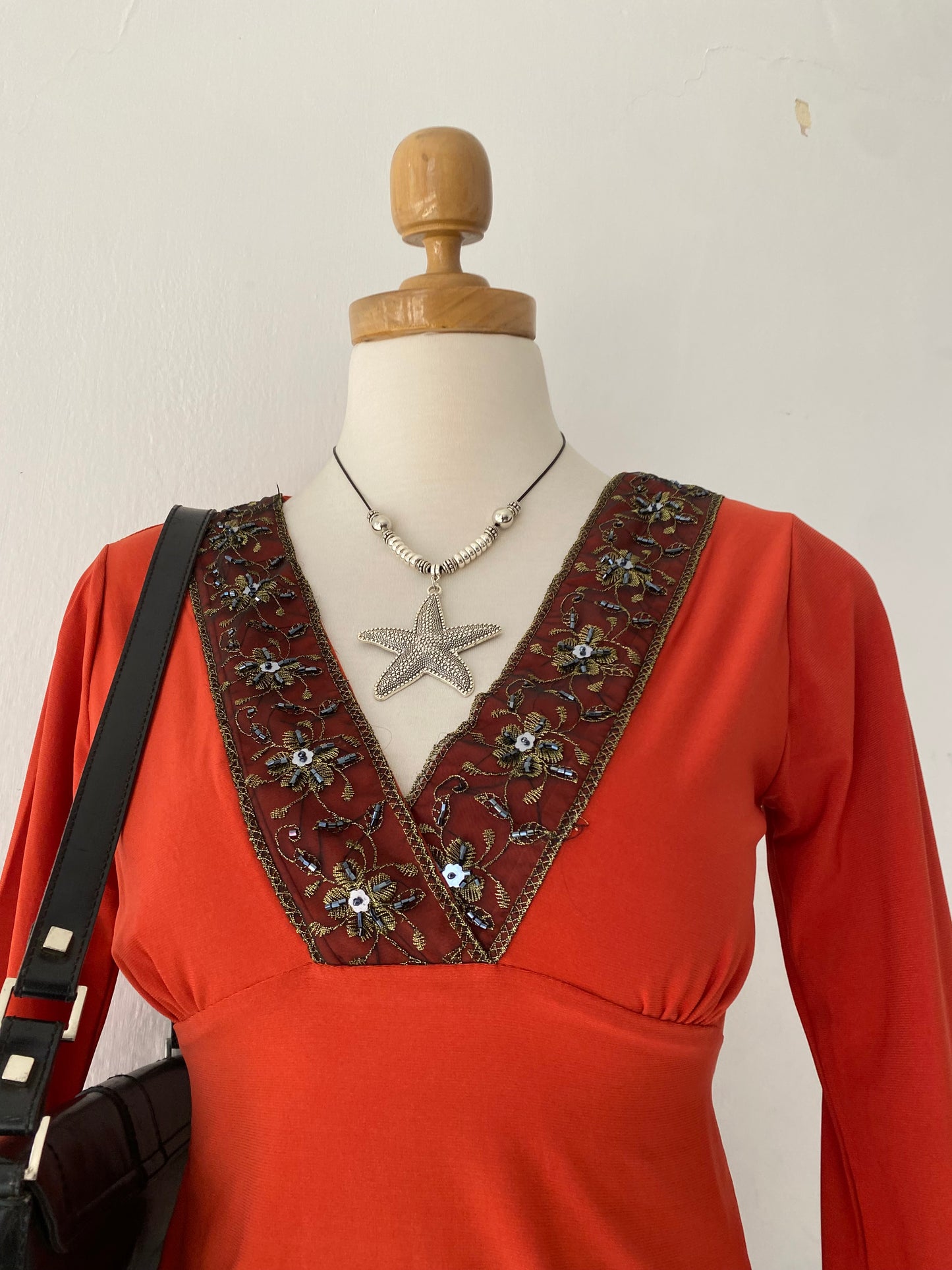 Bell-sleeved top