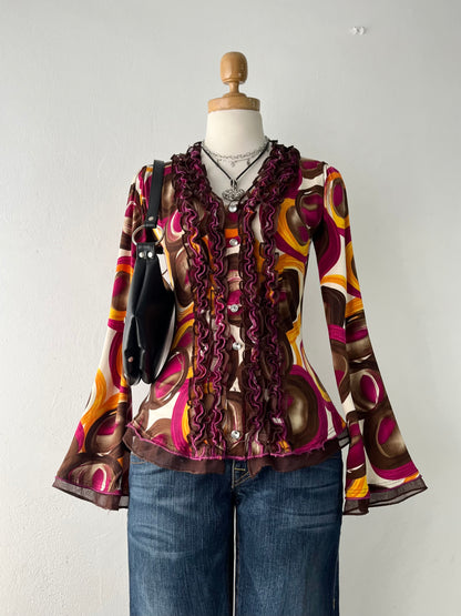 Victorian-style bell-sleeved top